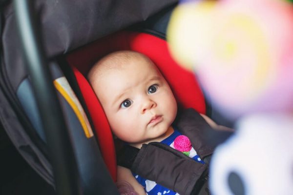 baby in car seat for baby's witching hour soothing