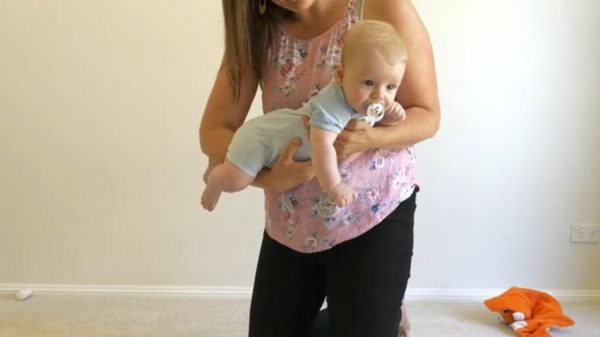 Football hold for tummy time variation 2