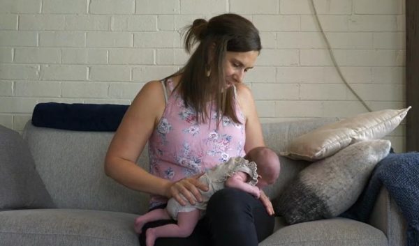 lie babies who hate tummy time across your lap