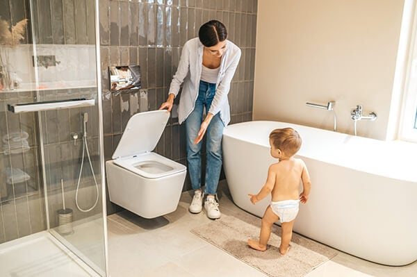toddler showing interest in toilet training
